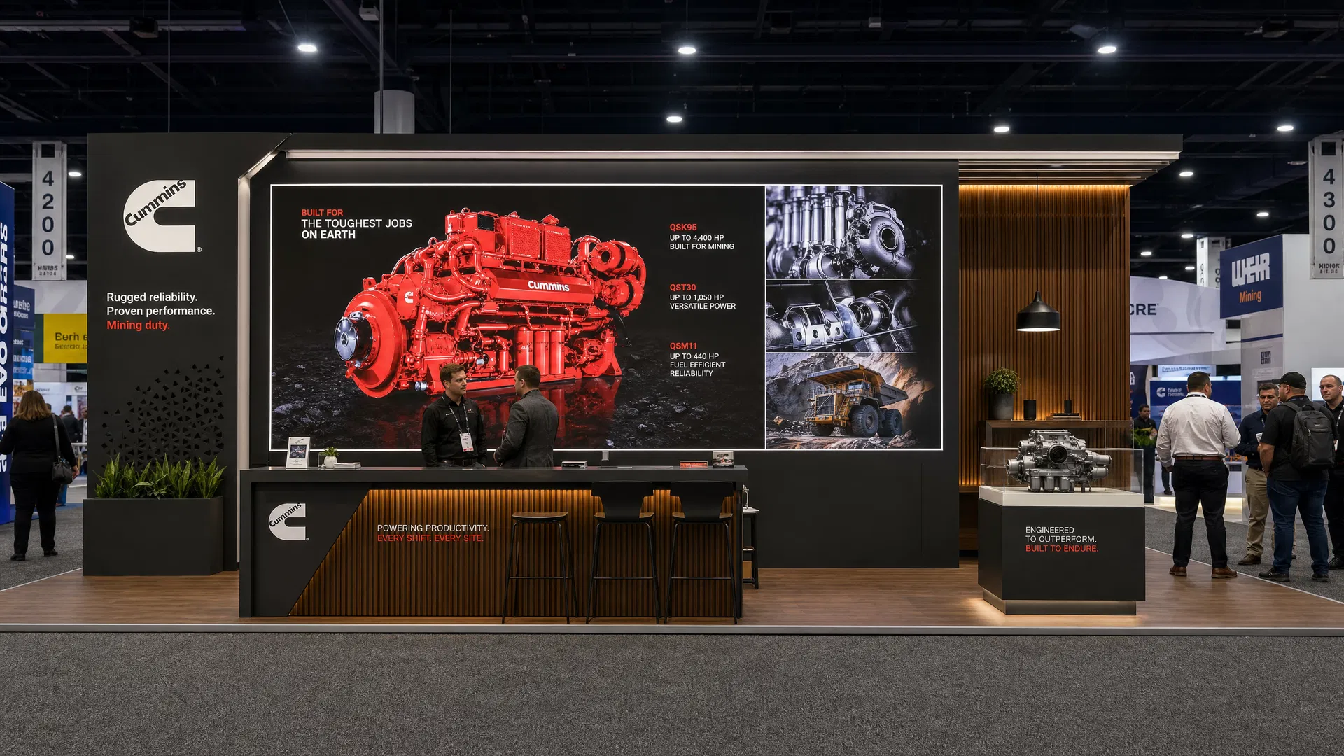 10' x 20' MINExpo inline LED exhibit for mining companies with a diesel-power engine storytelling backwall, wood-rib feature zone, and long consultation bar