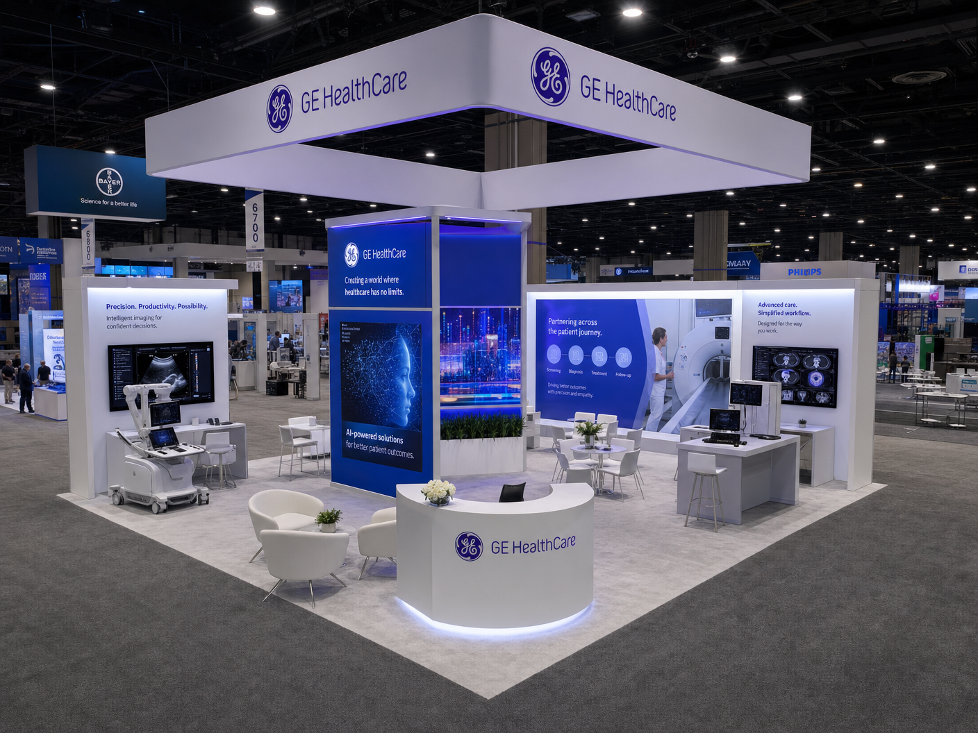 20' x 20' RSNA island LED exhibit with a central imaging tower, side consultation zones, and square hanging sign